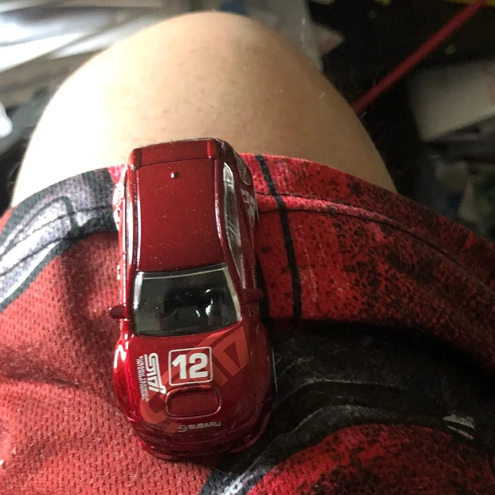 Red Die-Cast Toy Race Car with Number 12
